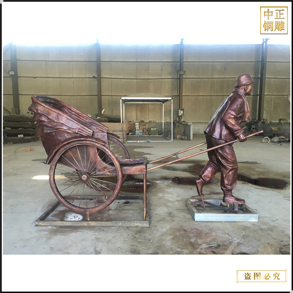 2步行街拉车人物铜雕塑铸造.jpg