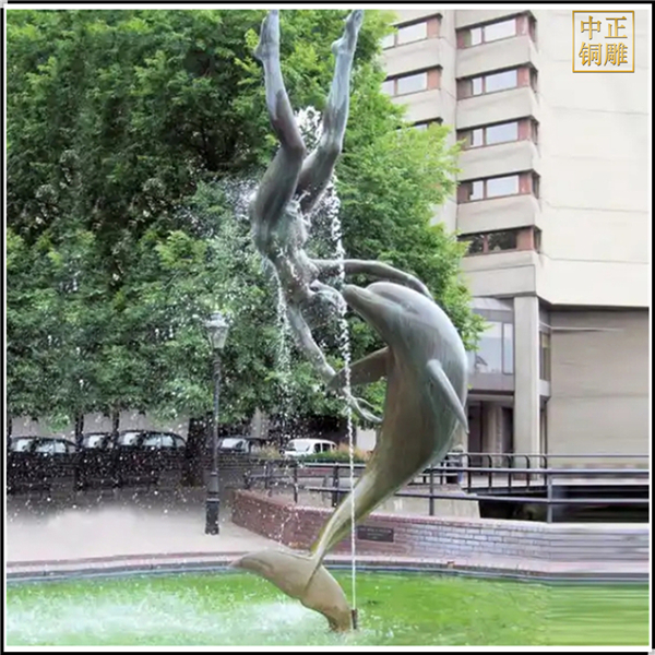海豚鱼人玩耍喷泉雕塑.jpg